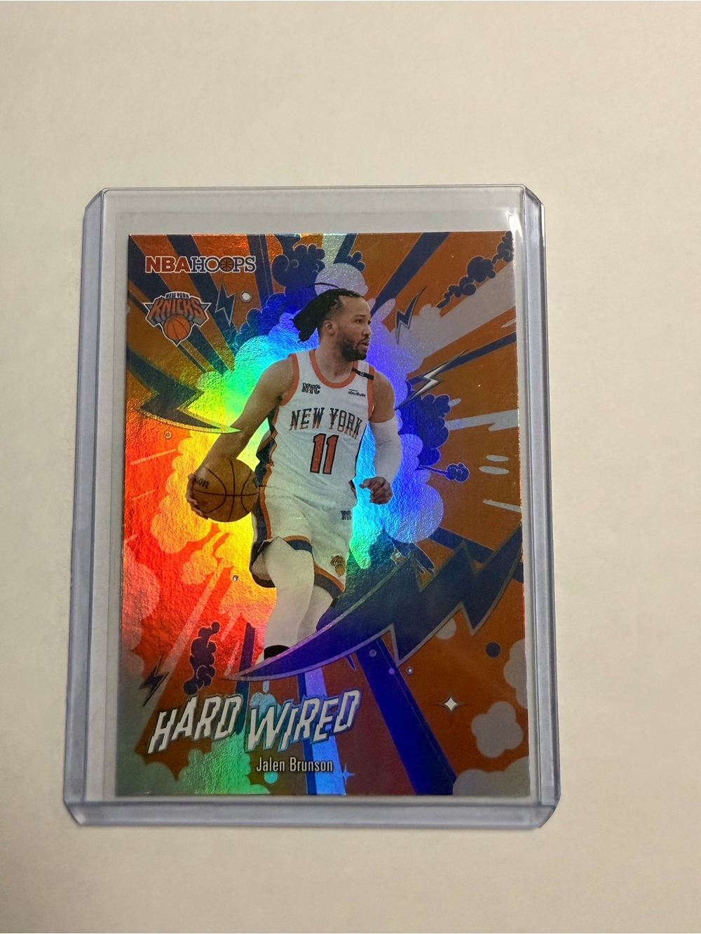 Topps NBA Hoops Jalen Brunson Orange Holographic Hard Wired Card